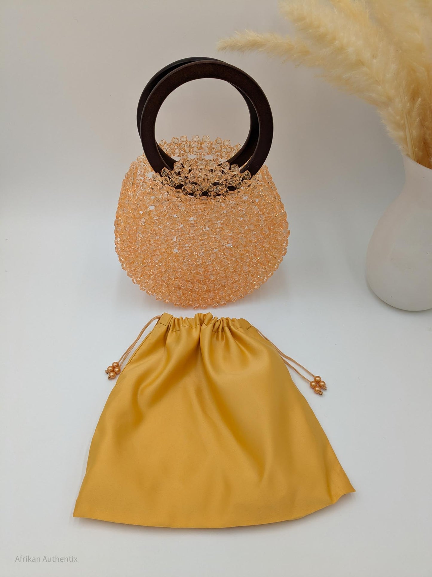Peach beaded bag with wooden handle | alfayed