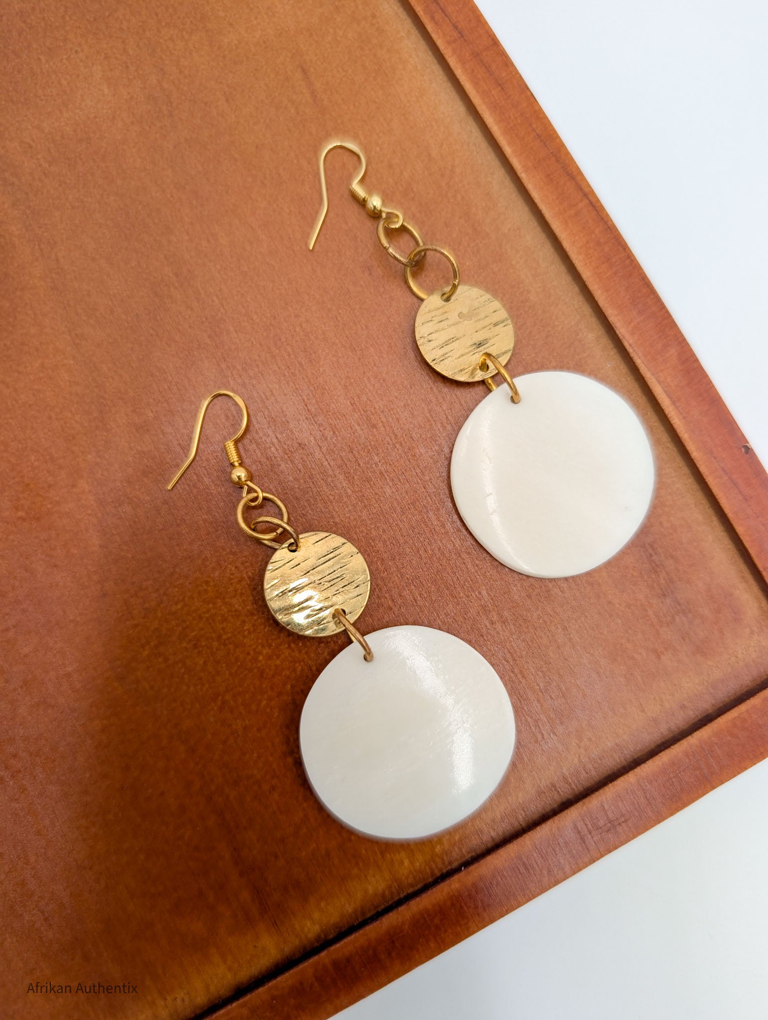 handmade bone and brass African disc earrings from Afrikan Authentix
