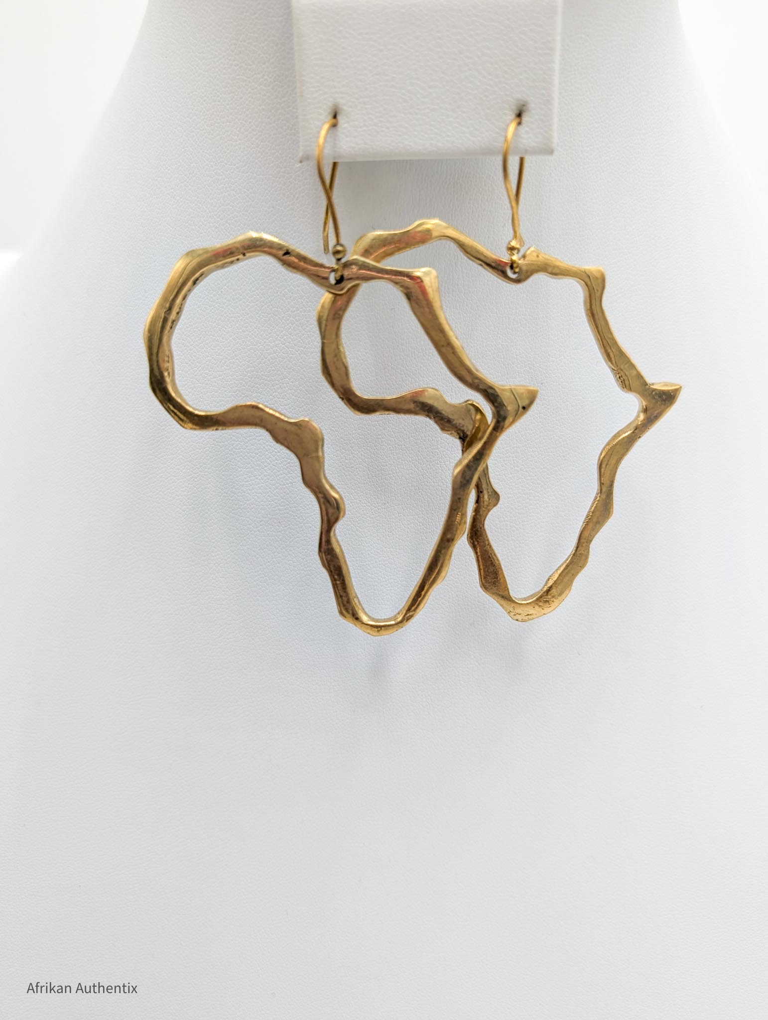 Gold Africa outline earrings