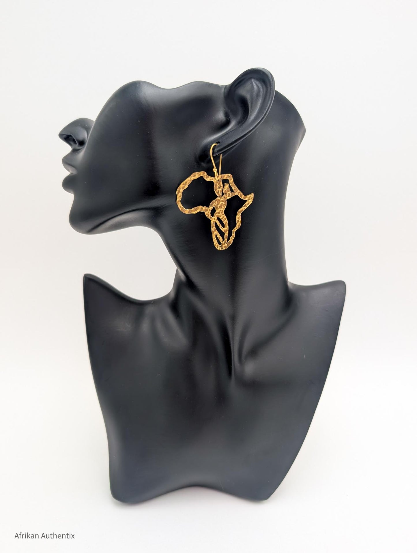 Gold Africa-shaped earrings 