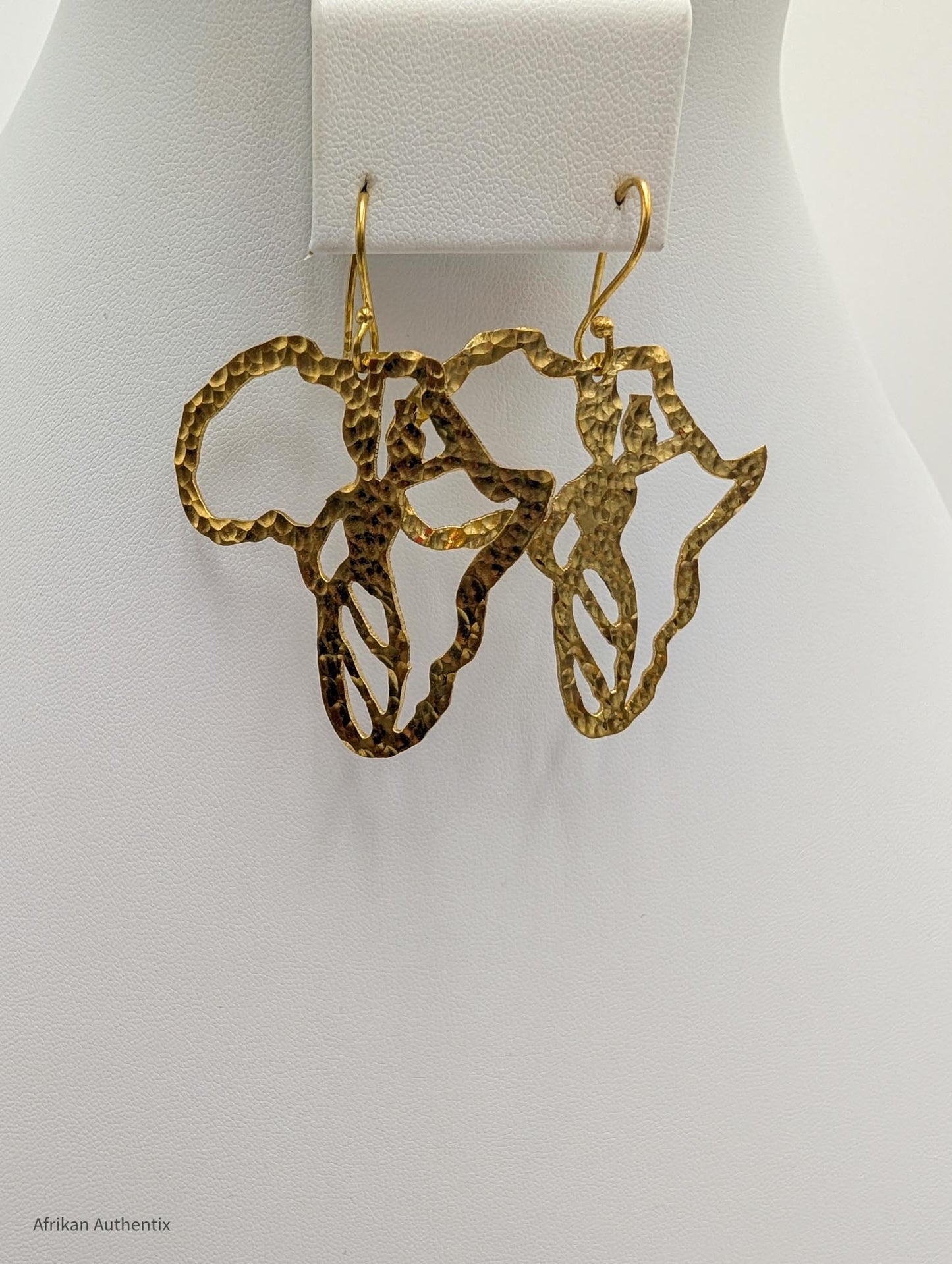 Gold Africa-shaped earrings 