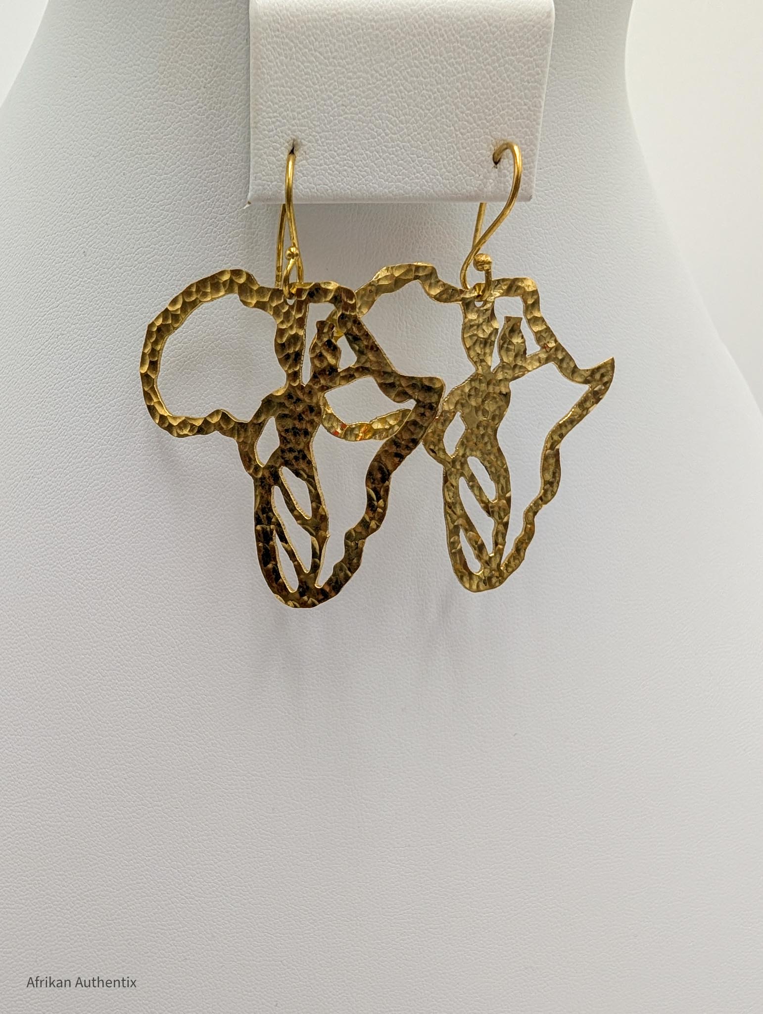 Gold Africa-shaped earrings 
