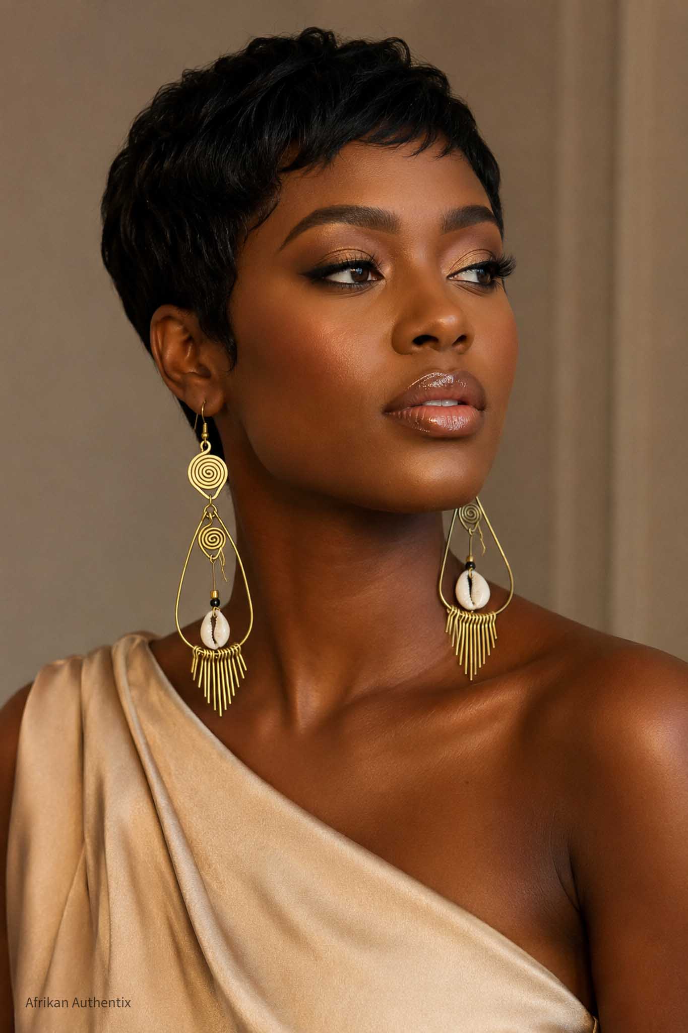 Brass cowrie shell earrings