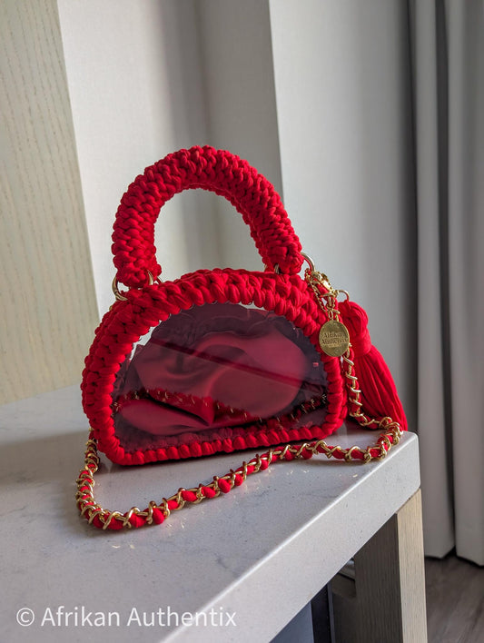 Red crochet mini handbag with gold chain strap and clear window by Afrikan Authentix
