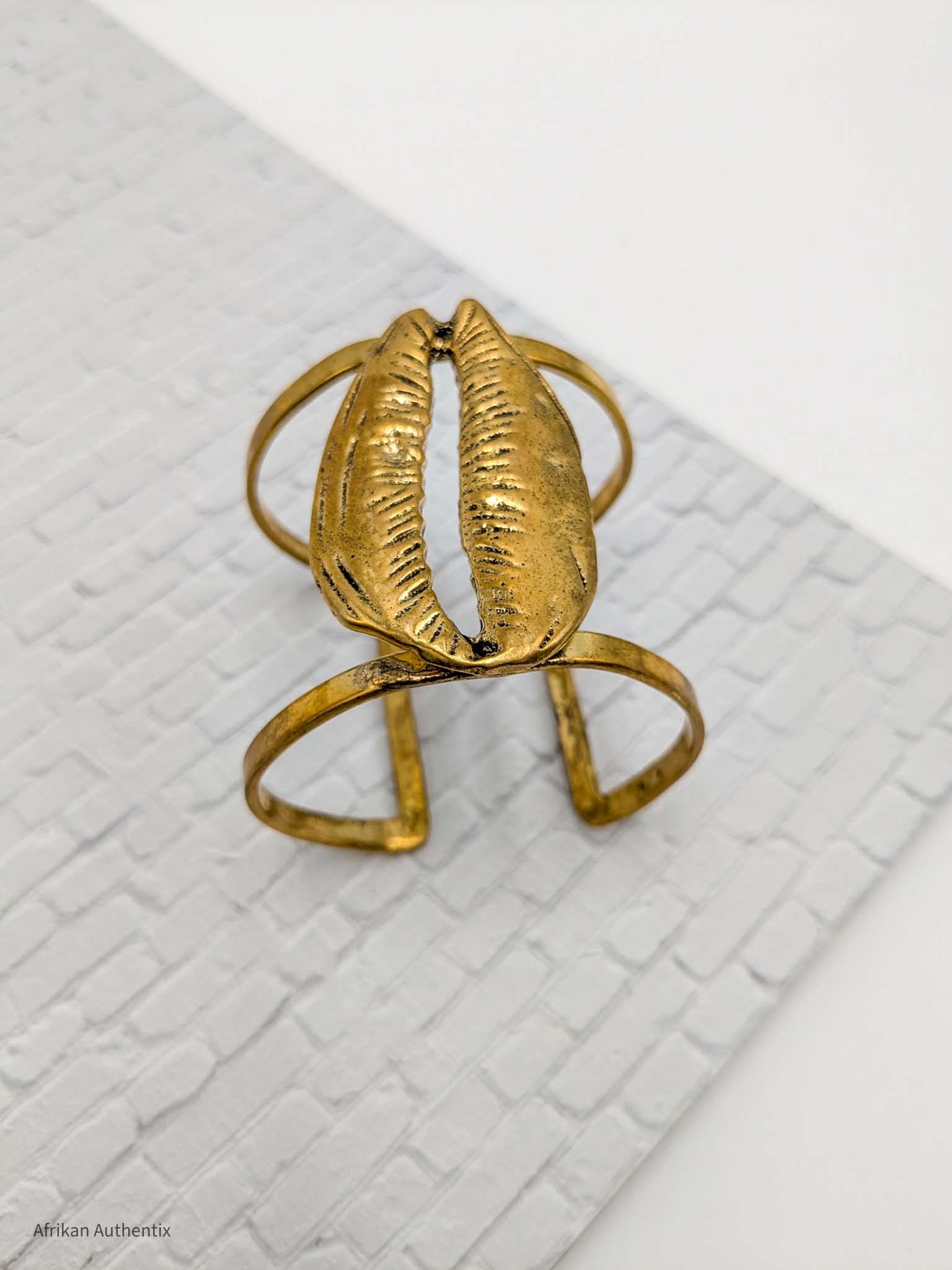 Chunky cowrie shell cuff bracelet