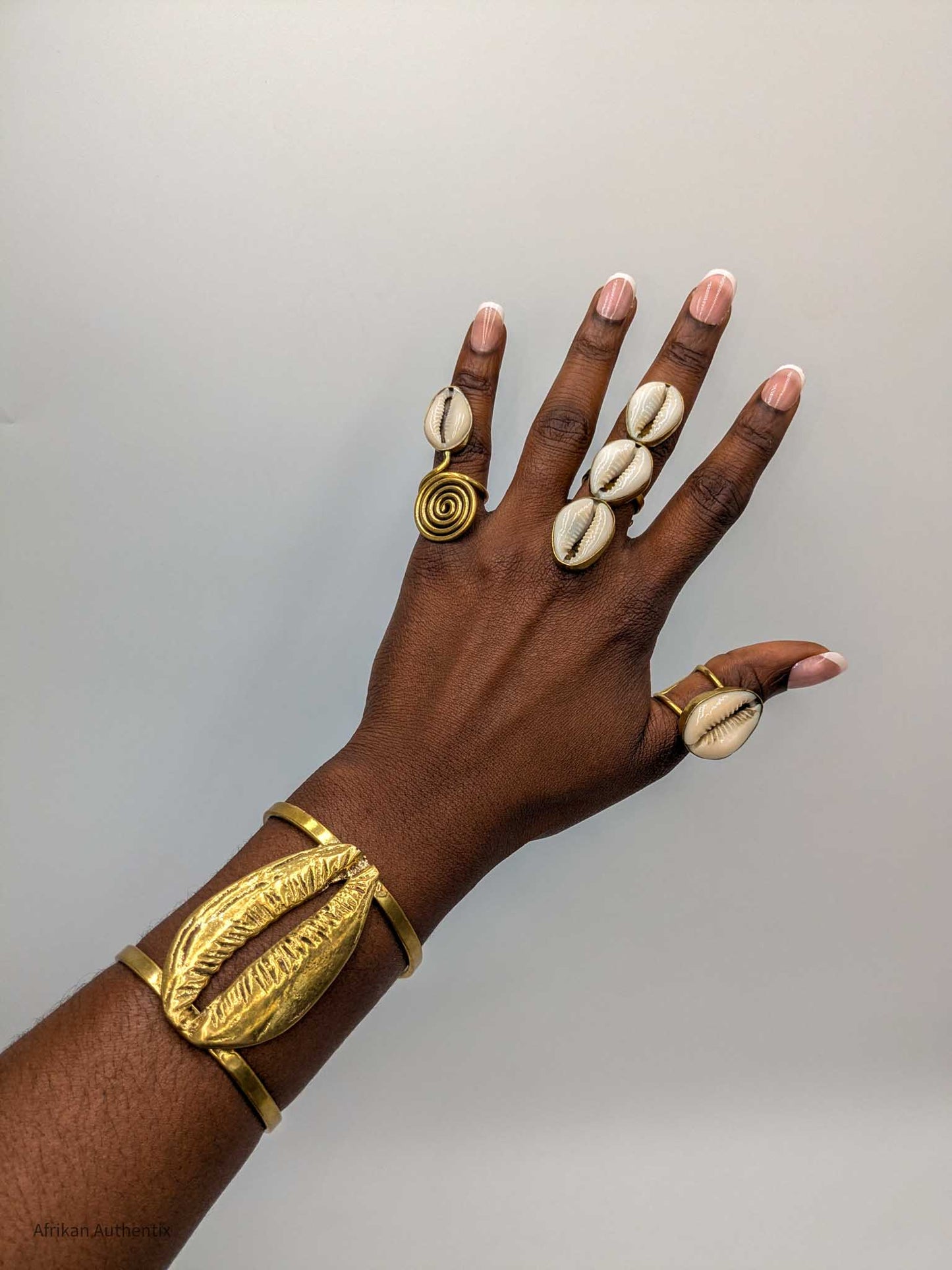 Chunky cowrie shell cuff bracelet
