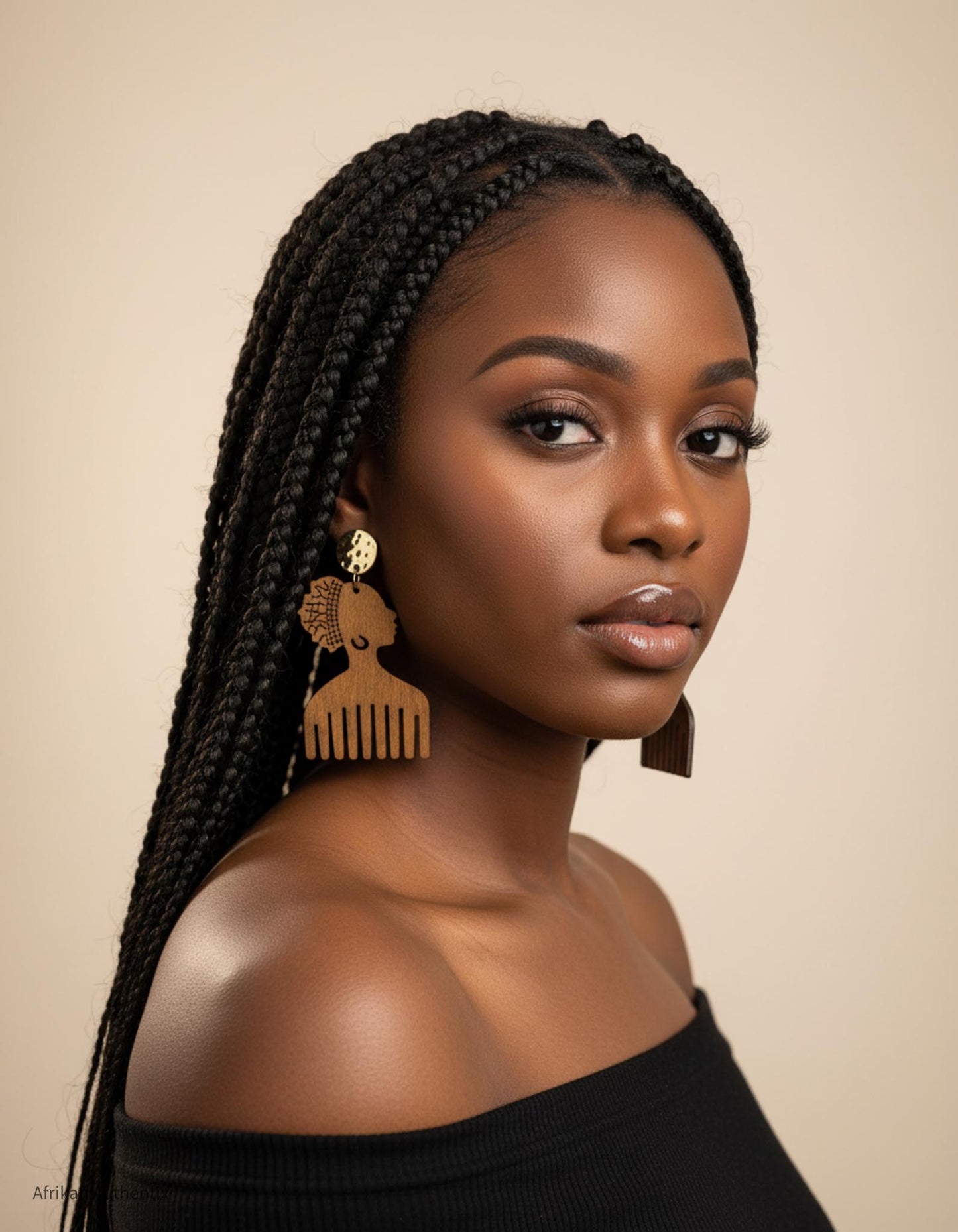 Woman with braided hair wearing afro comb wooden earrings
