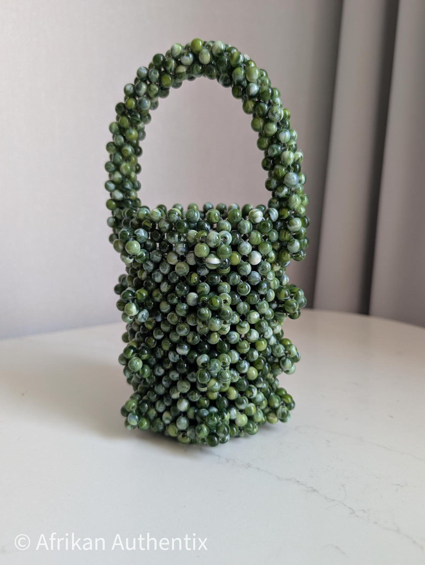 Green mini beaded bucket bag