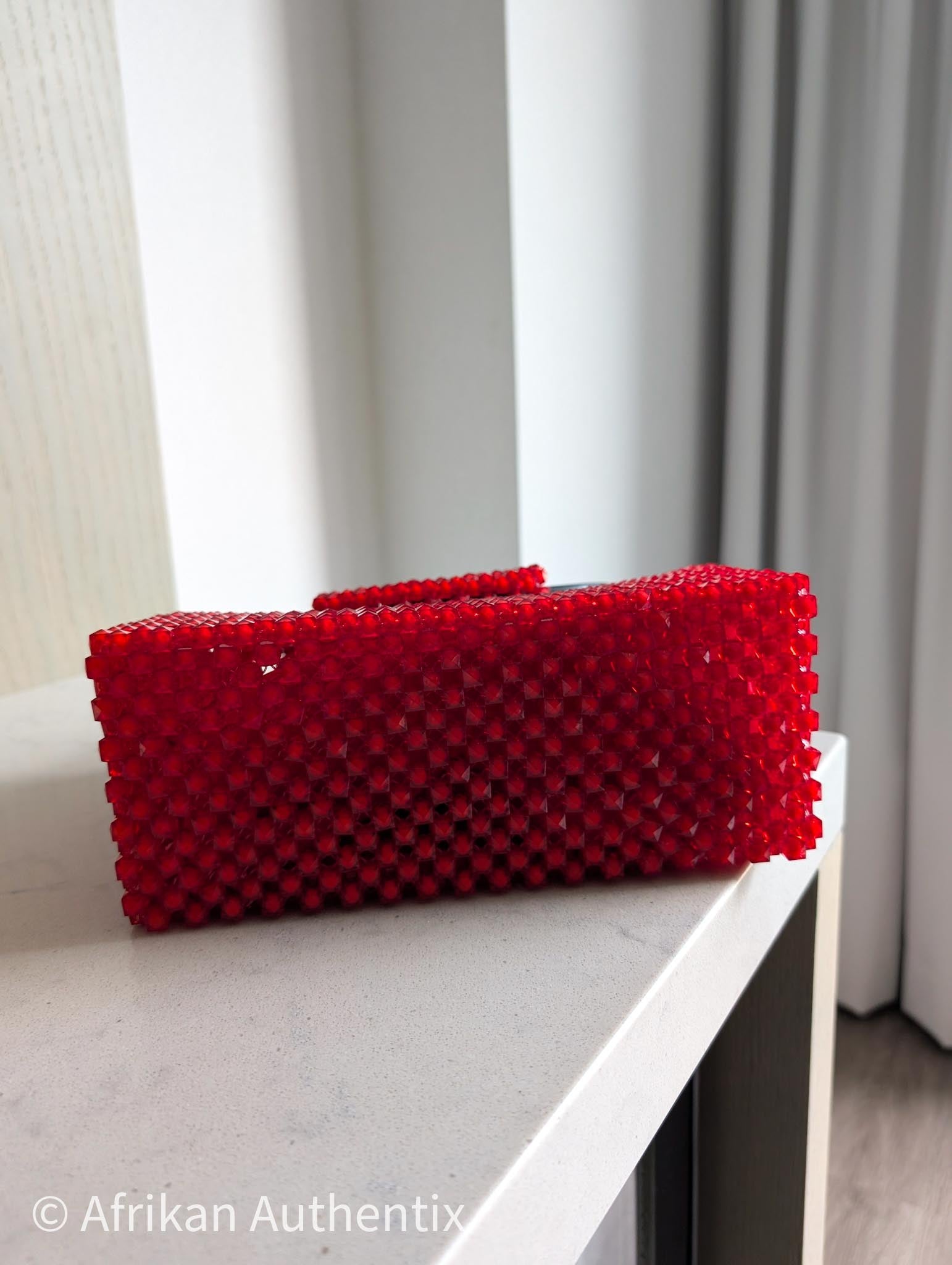 Red beaded square handbag with black wooden handle handmade in Ghana by Afrikan Authentix