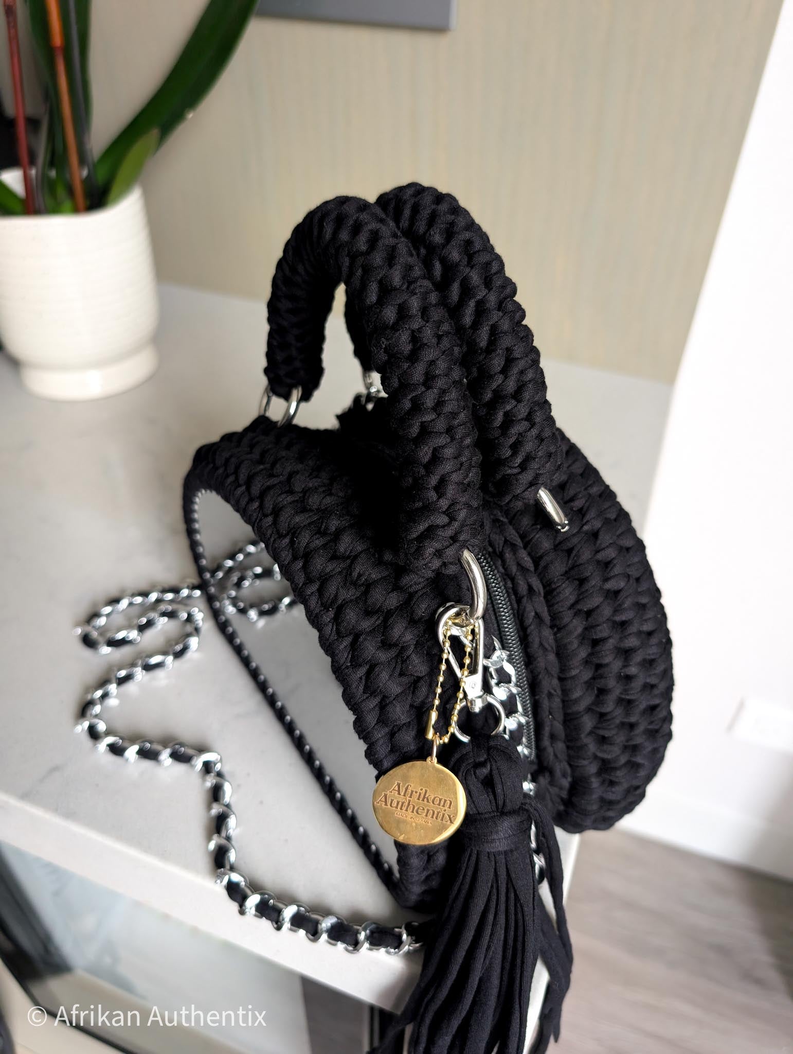 Black crochet handbag with silver chain strap and tassel by Afrikan authentix