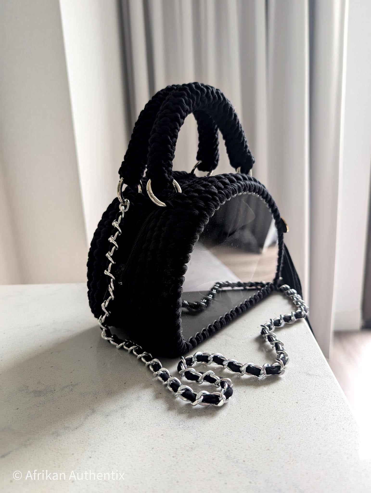 Black crochet handbag with silver chain strap and tassel by Afrikan authentix