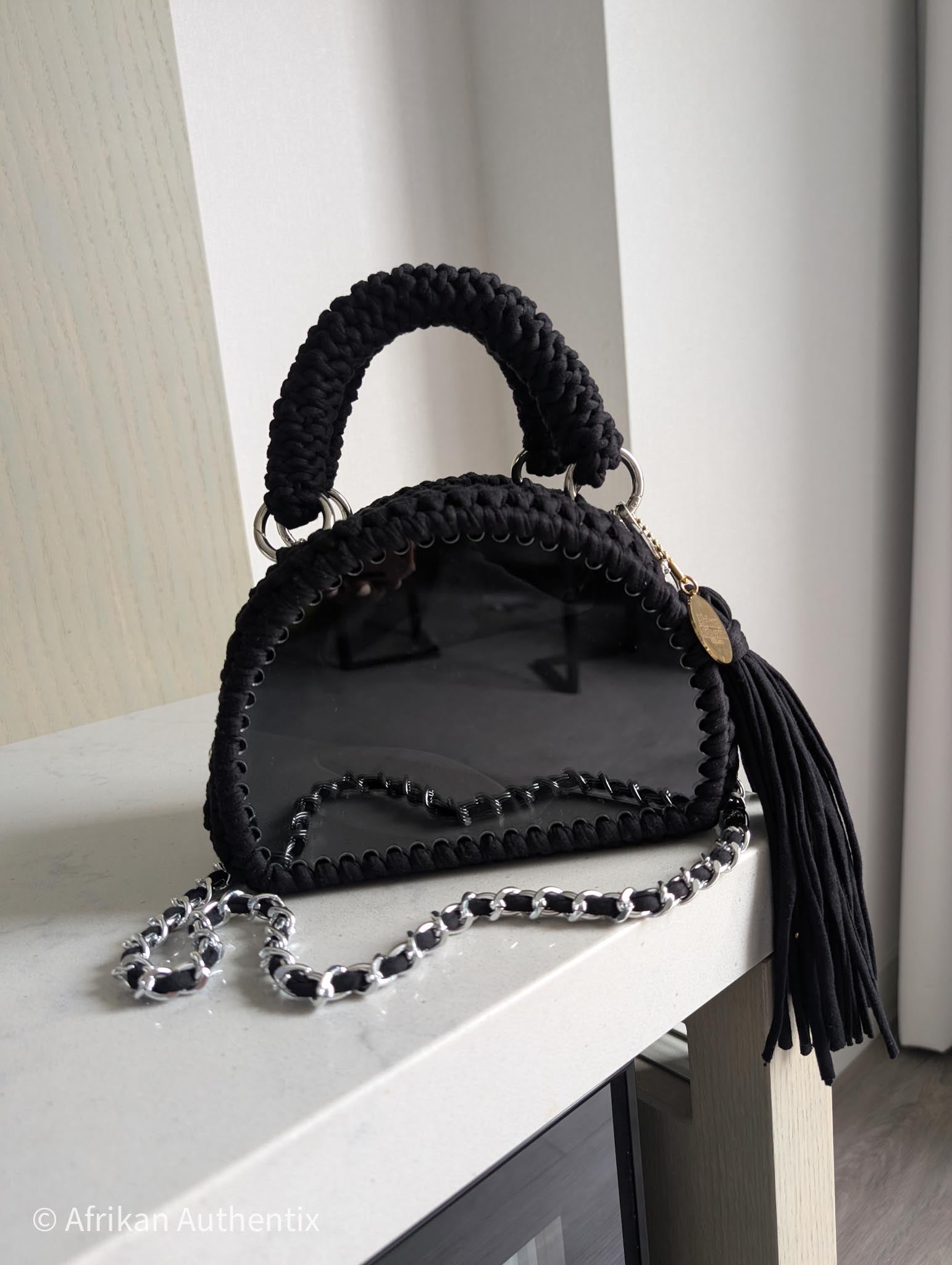 Black crochet handbag with silver chain strap and tassel by Afrikan authentix