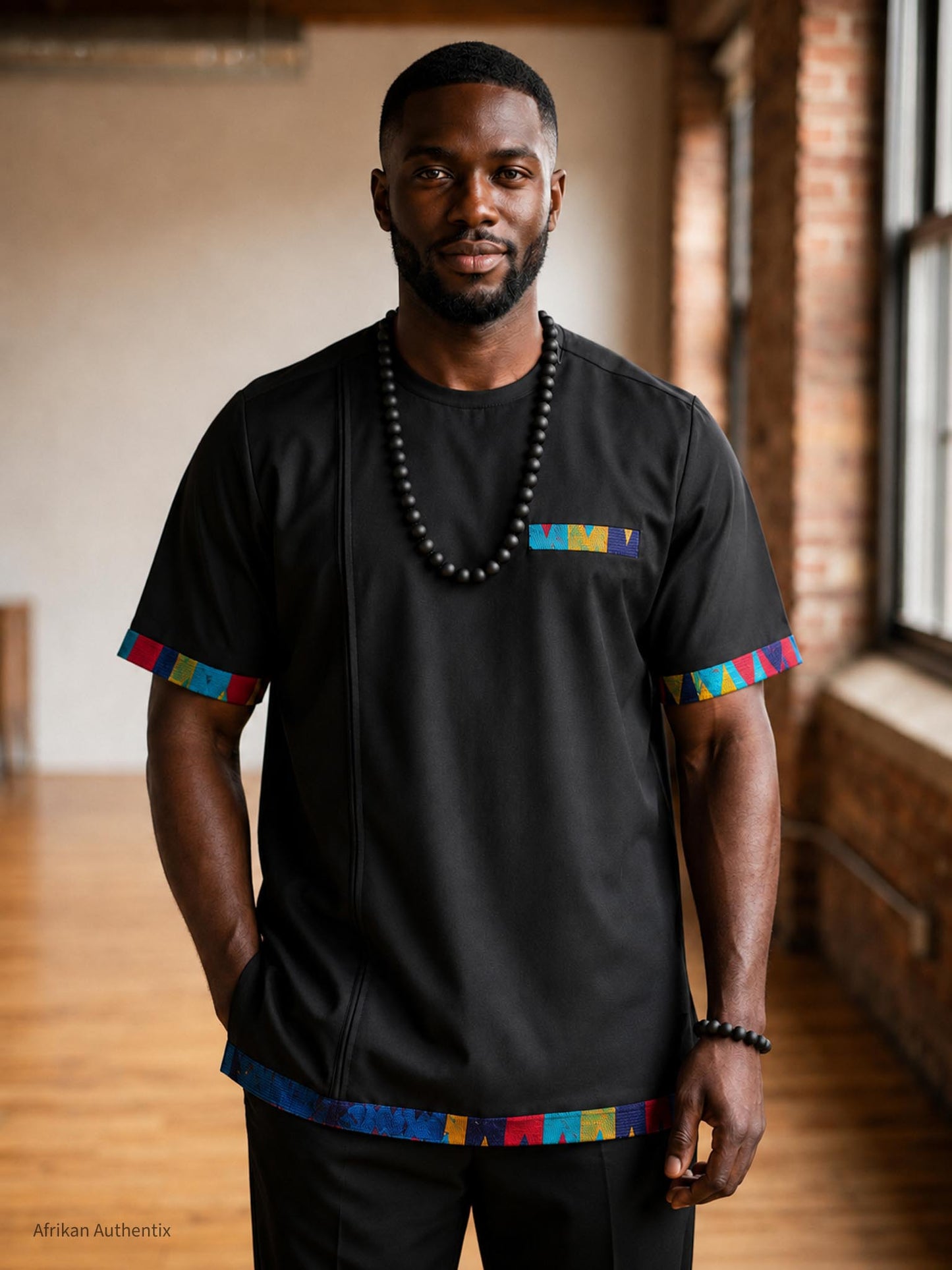 Black African men’s shirt handmade in Ghana with handwoven Kente trim
