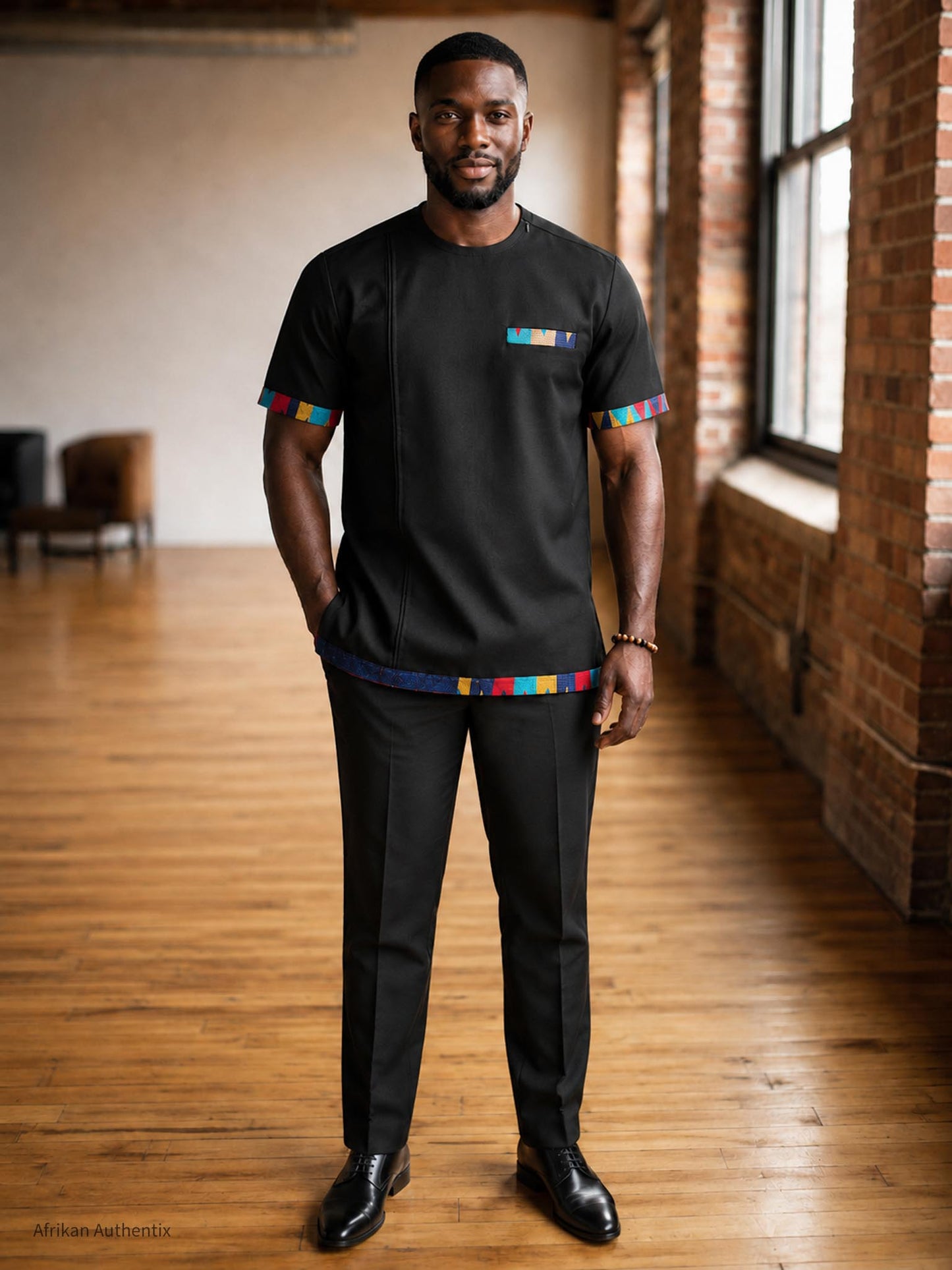 African men’s shirt styled with black dress pants and dress shoes